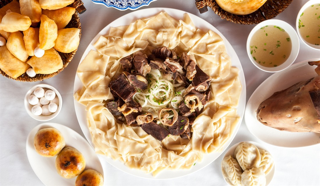 Traditional Kazakh dishes on display. © Shutterstock/iPostnikov