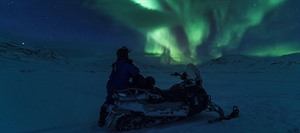 Northern Lights by snowmobile