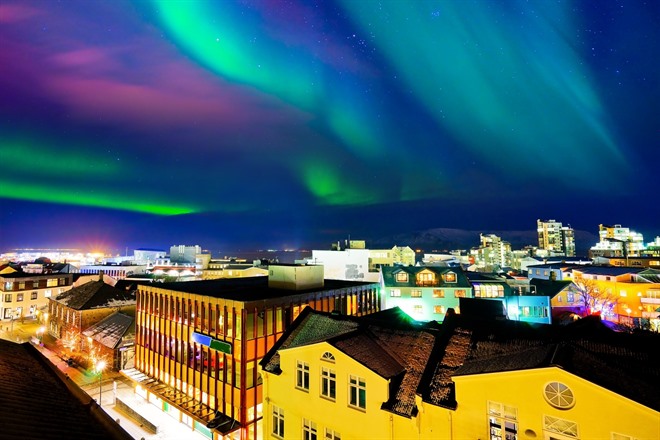 Northern lights over Reykjavík - Iceland