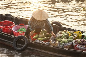 A local seller in Cai Rang Floating Market