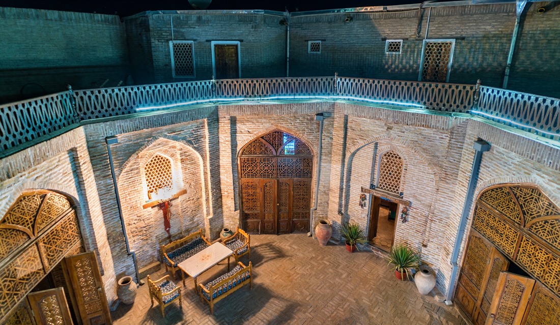 Courtyard of a medieval caravanserai in Bukhara, Uzbekistan