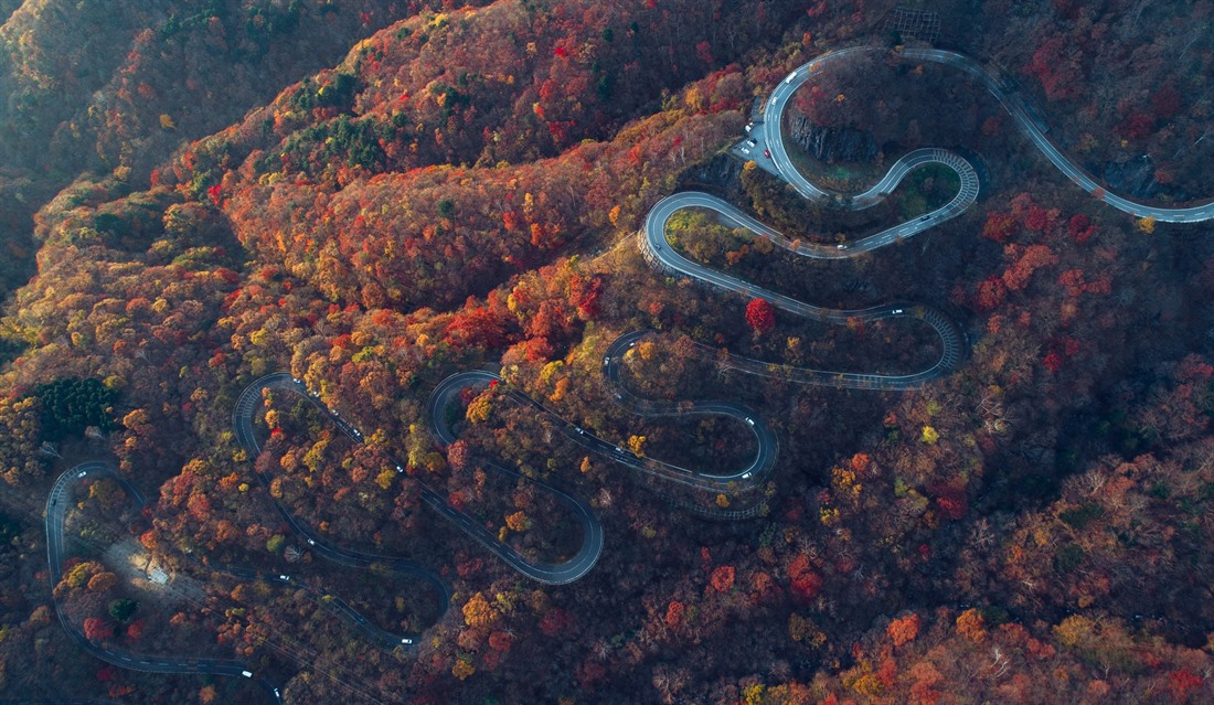 A road winds down a hill near Nikko in Tochigi prefecture