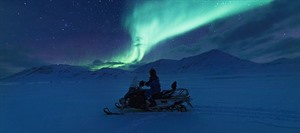 Northern Lights by snowmobile