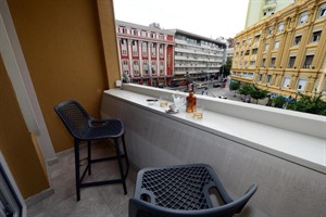 Deluxe Room balcony with square view at Alexandar Square Hotel