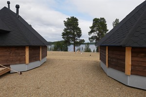 View of Inari Lake through Aurora Cabins