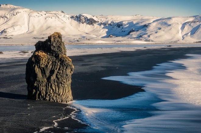 volcanic black sands of Reynisfjara beach in Winter - Iceland