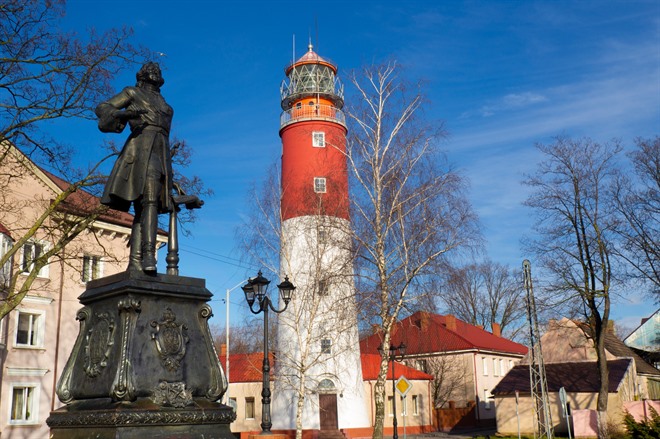 View of Peter the Great Statue and the lighthouse at Baltiysk