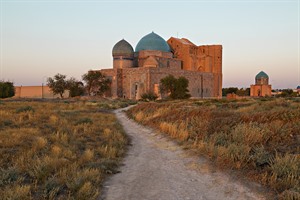 Mausoleum of Khoja Ahmed Yasawi at the sunset , in the city of Turkest